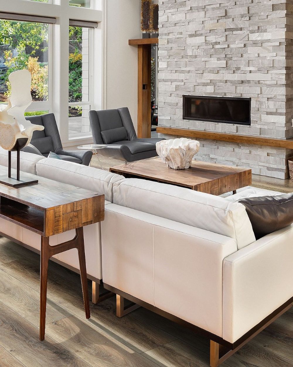 A bright living room finished in BOAD premium stone-composite flooring